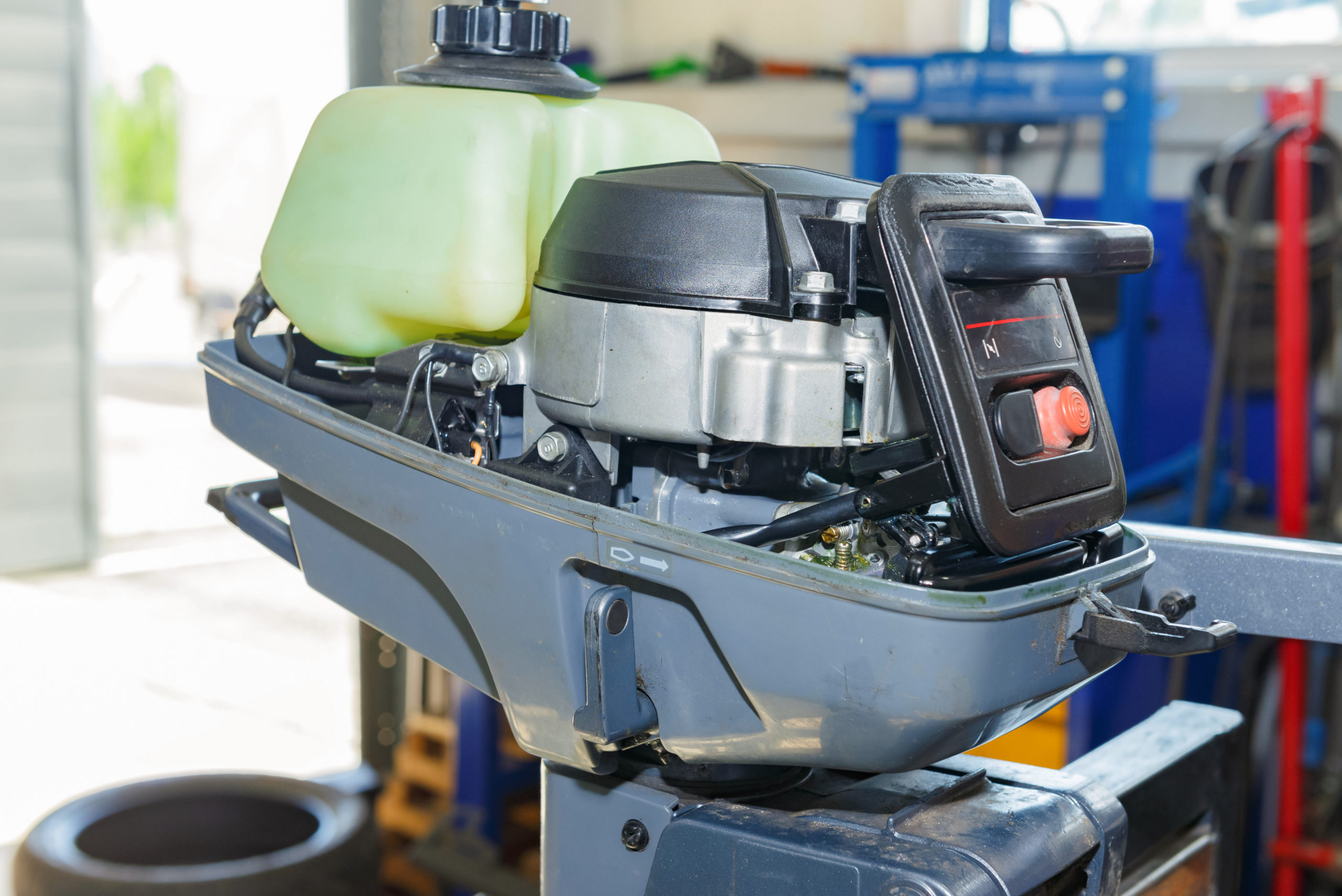 The master carries out maintenance of the boat motor.